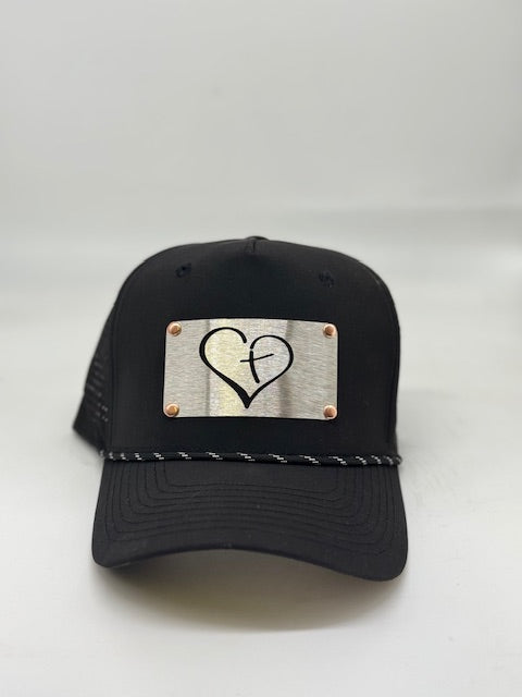 Heart/cross badge, High top rope hat.